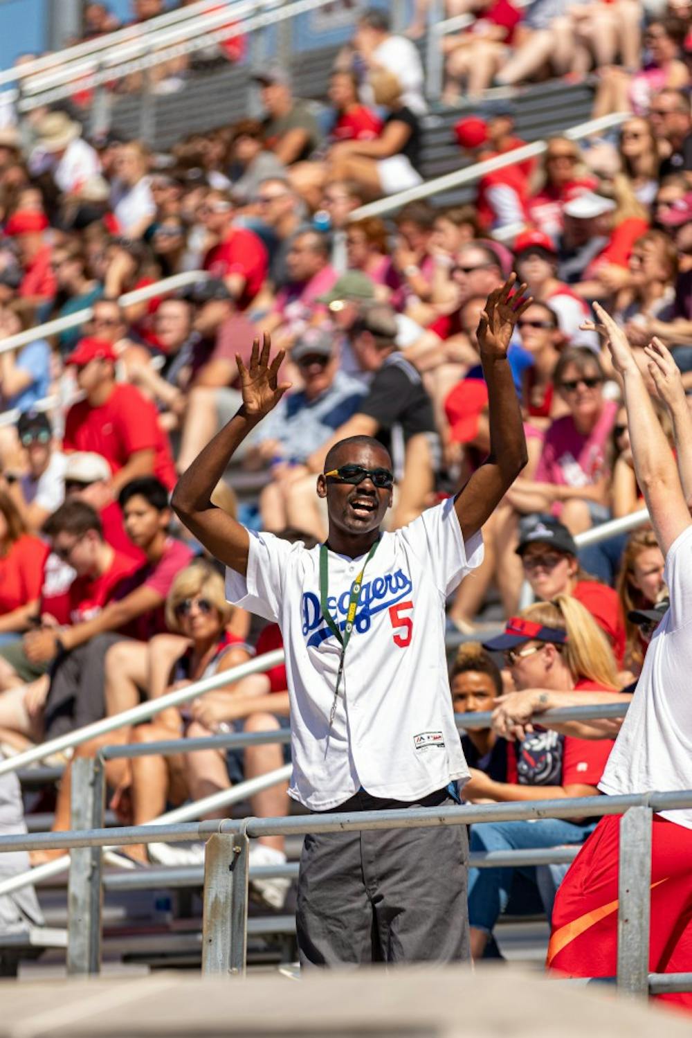 <p>Ball State fan, Sam Nealy cheers on the Cardinals as they play Florida Atlantic. FAU went on to defeat Ball State 41-31, Sept. 14, 2019. <strong>Paul Kihn, DN</strong></p>