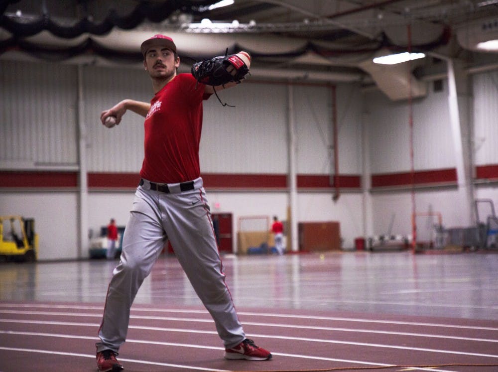 <p>Then-junior pitcher John Baker throws a ball during a drill at practice Jan. 29, 2019, at the Field Sports Building. Baker led the Cardinals with 15 starts in the 2018 season along with a 3.68 ERA. <strong>Zach Piatt, DN</strong></p>