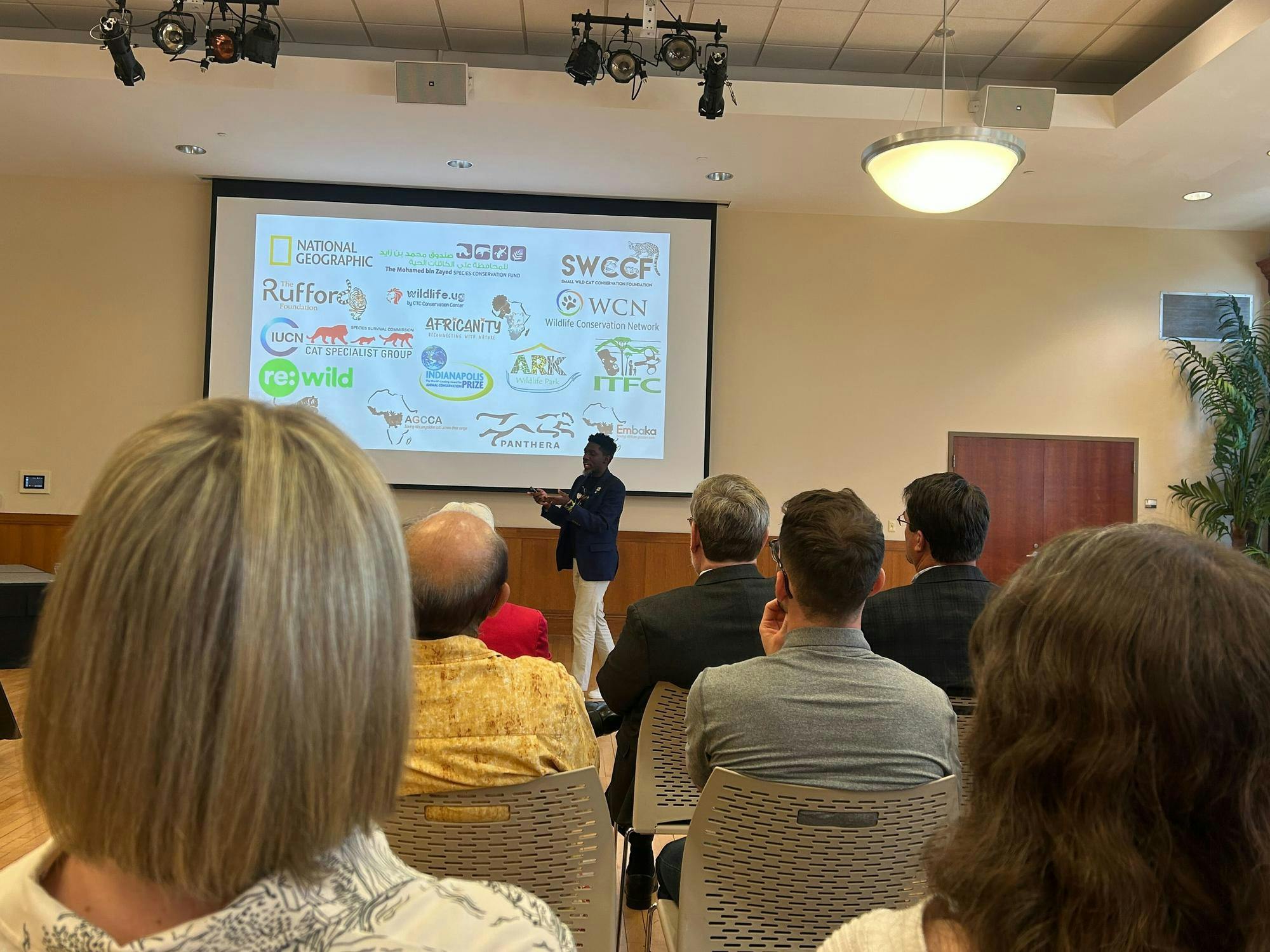 2025 Indianapolis Prize Emerging Conservationist Award recipient Mwezi “Badru” Mugerwa presents his conversationalist research at Ball State University's L.A Pittenger Student Center Ballroom Sept. 30. Mugerwa's research focuses on the Golden African Cat species. Kylee White, DN