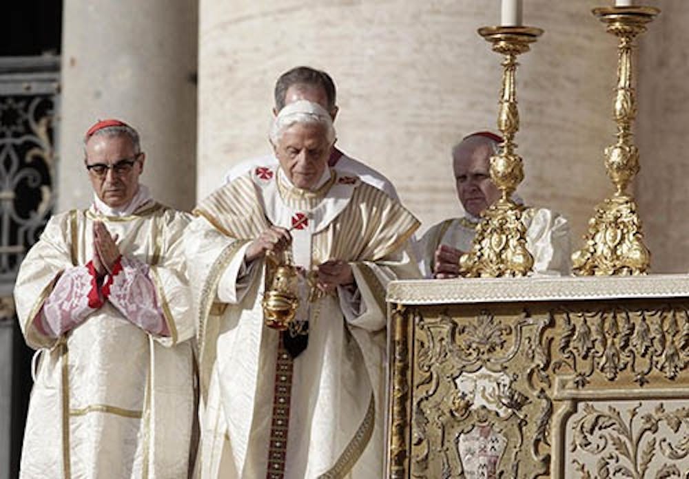 Pope Benedict XVI arrives for a ceremony for the canonization of seven new saints on Oct. 21, 2012 in St. Peter’s Square in Vatican City. The conclave to elect a new pope will begin today. MCT PHOTO