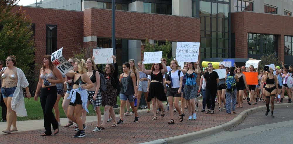 Students participate in a&nbsp;SlutWalk led by Ball State's Feminists for Action and in collaboration with Ball State's Alliance for Disability Awareness.&nbsp;Photo by Emma Millikan