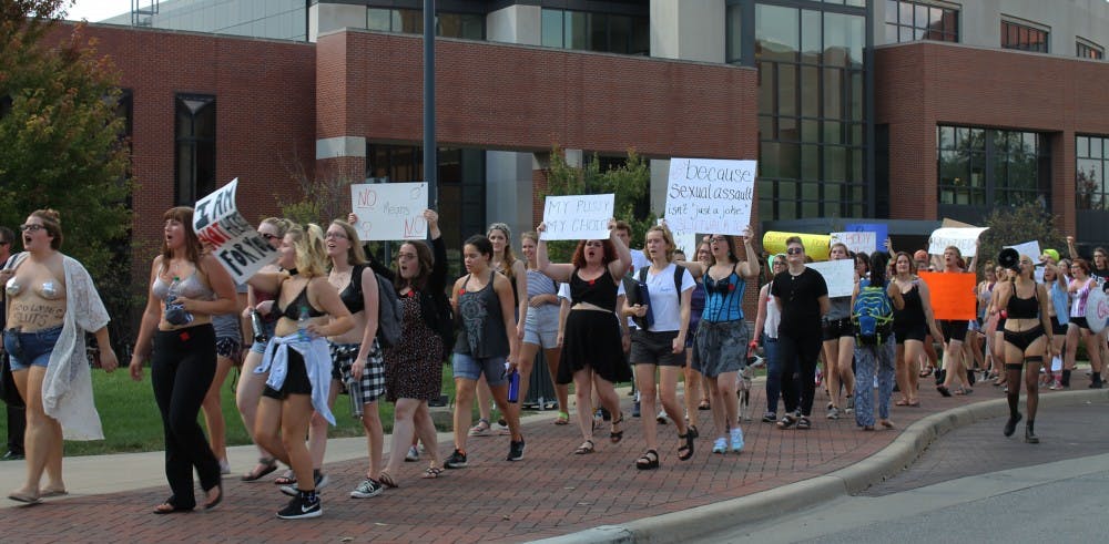 <p>Students participate in a&nbsp;SlutWalk led by Ball State's Feminists for Action and in collaboration with Ball State's Alliance for Disability Awareness.&nbsp;Photo by Emma Millikan</p>