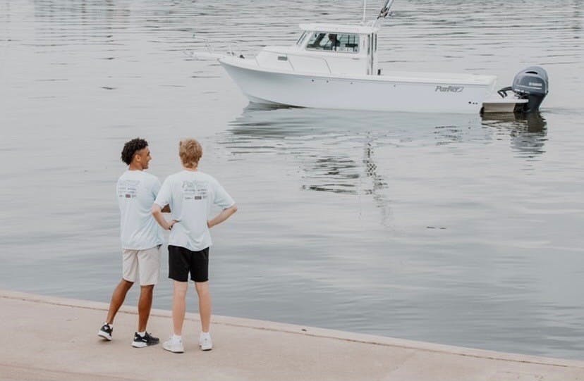 Eddie Gill IV (left) and Justin Shupe (right) stand at Dress Plaza in Evansville, Indiana on the morning of their sendoff for &quot;Journey for a Cause.&quot; The trip concluded June 10 at Juana’s Pagodas in Navarre, Florida. Eddie Gill IV, Photo Provided