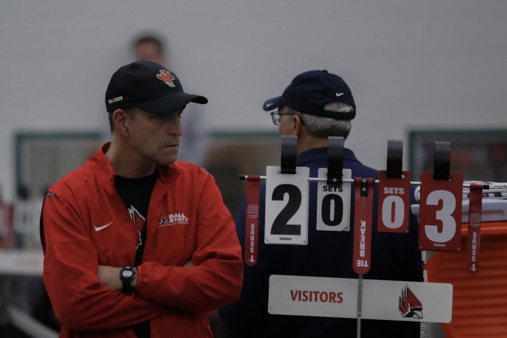 <p>Volunteer Coach Gene Orlando watches the doubles matches against Cleveland State University Feb. 10 at Muncie YMCA. Ball State Men's Tennis won 5-2. Kate Tilbury, DN</p>