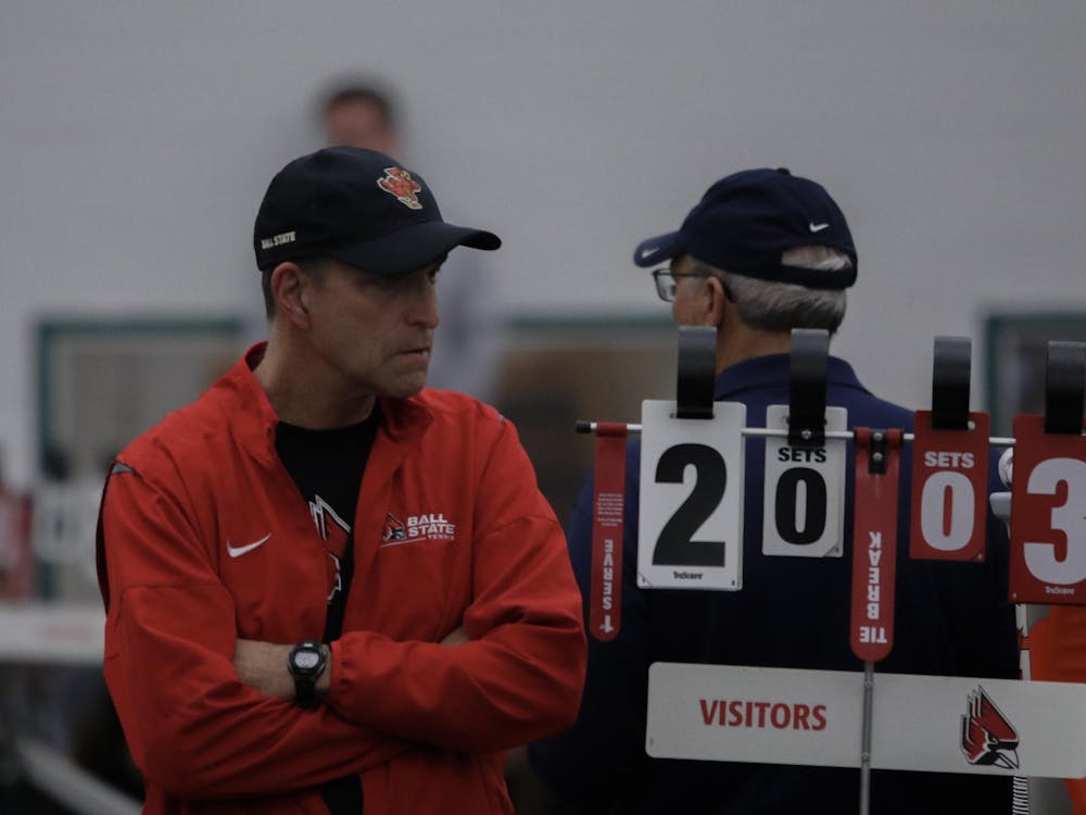 Volunteer Coach Gene Orlando watches the doubles matches against Cleveland State University Feb. 10 at Muncie YMCA. Ball State Men's Tennis won 5-2. Kate Tilbury, DN