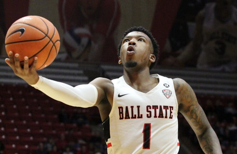 Junior guard Jontrell Walker shoots a layup in the second half of Ball State’s game against Stony Brook on Nov. 17 in John E. Worthen Arena. Walker scored eight points. Paige Grider, DN