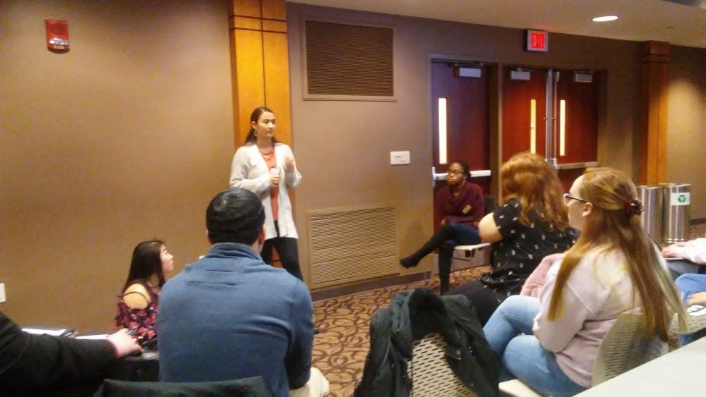 On-Campus Chair Miryam Bevelle speaks to her caucus during a five minute meeting at the Student Government Association (SGA) meeting Wednesday, Feb. 13, 2019, in the L.A. Pittenger Student Center. SGA intends on automatically signing up all members of the Ball State community for the university's emergency text alert system. Charles Melton, DN