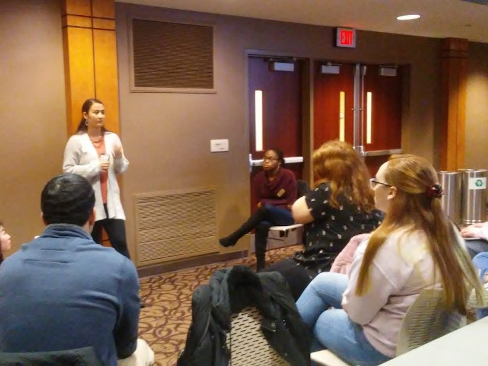 On-Campus Chair Miryam Bevelle speaks to her caucus during a five minute meeting at the Student Government Association (SGA) meeting Wednesday, Feb. 13, 2019, in the L.A. Pittenger Student Center. SGA intends on automatically signing up all members of the Ball State community for the university's emergency text alert system. Charles Melton, DN
