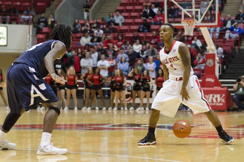 Freshman guard Zavier Turner dribbles the ball near the half-court line before driving the ball down the court against Akron on Jan. 8 at Worthen Arena. Turner scored six points. DN PHOTO BREANNA DAUGHERTY