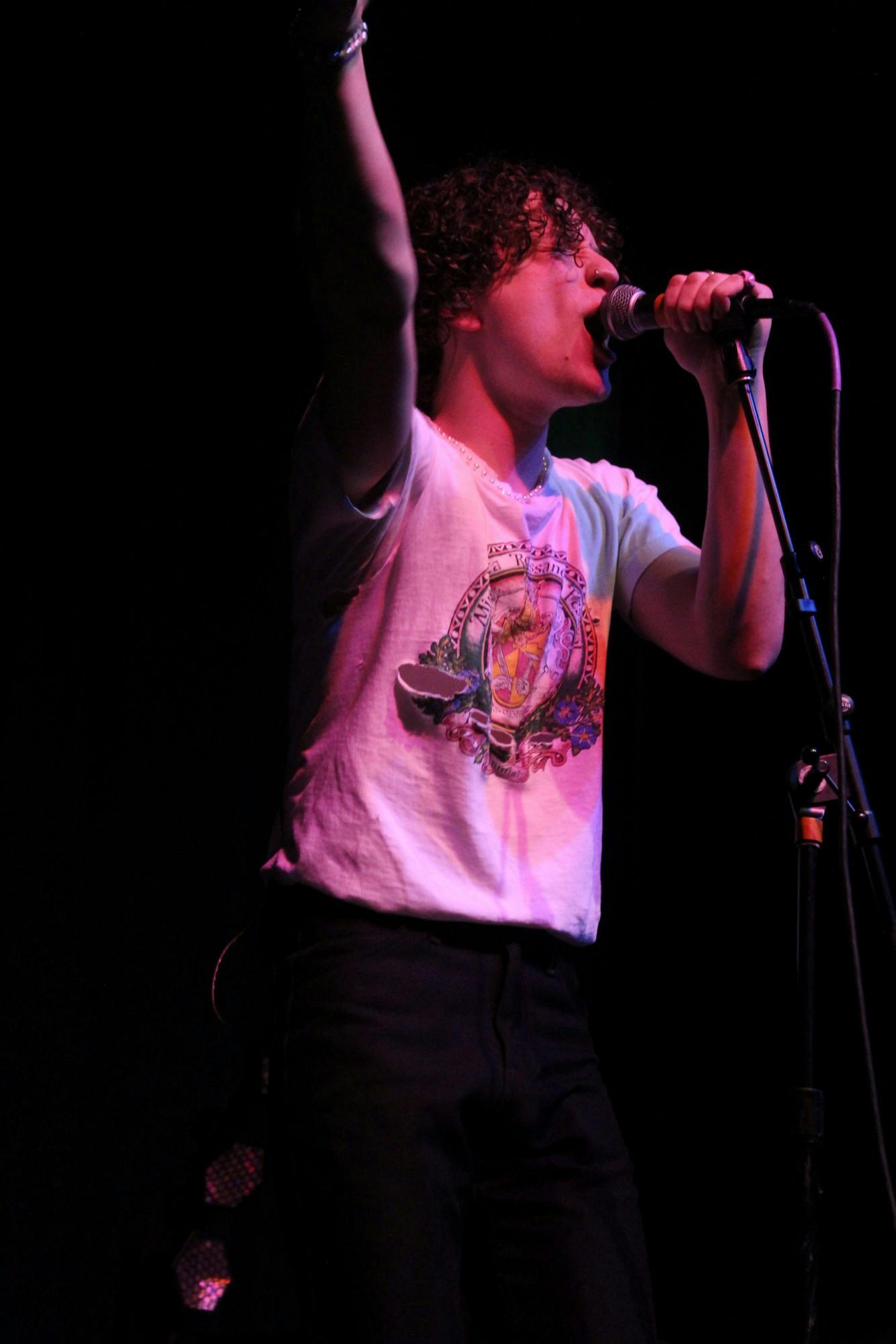 Hastings leans into the microphone while singing at the Old National Center, in Indianapolis, IN, on Tursday, March 24, 2022.