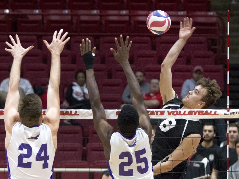 Outside attacker, Blake Reardon kills the ball past Grand Canyon blockers Matthew Kinnebrew and Drake Silbernagel at Worthen Arena, March 2. Ball State lost to Grand Canyon over a stretched out 5 set match. (Grace Hollars // DN)