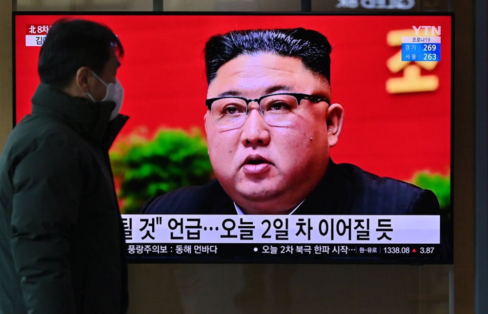 A man watches a television screen showing news footage of North Korean leader Kim Jong Un attending the 8th congress of the ruling Workers' Party held in Pyongyang, at a railway station in Seoul on January 6, 2021. (Jung Yeon-je/AFP via Getty Images/TNS)