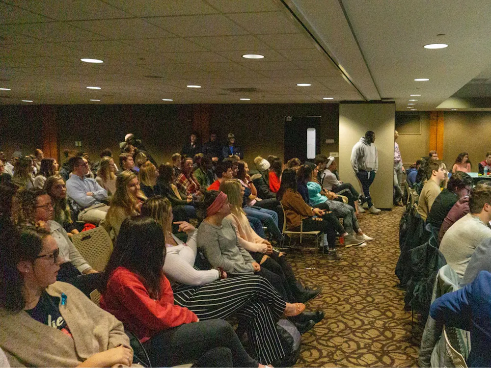 A gallery full of Greek Life members looks on as senator Isaac Mitchell explains the Greek Life Zero Tolerance resolution, which he co-authored. Each speaker was limited to three minutes to speak at a time. John Lynch, DN