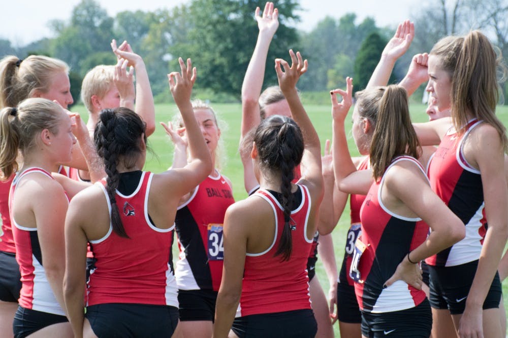 The Ball State cross country team chirps  before the meet begins against IUPUI on Sept. 23, 2016 at the Muncie Elks Country Club.  Ball State won against IUPUI 16-46. Kaiti Sullivan // DN