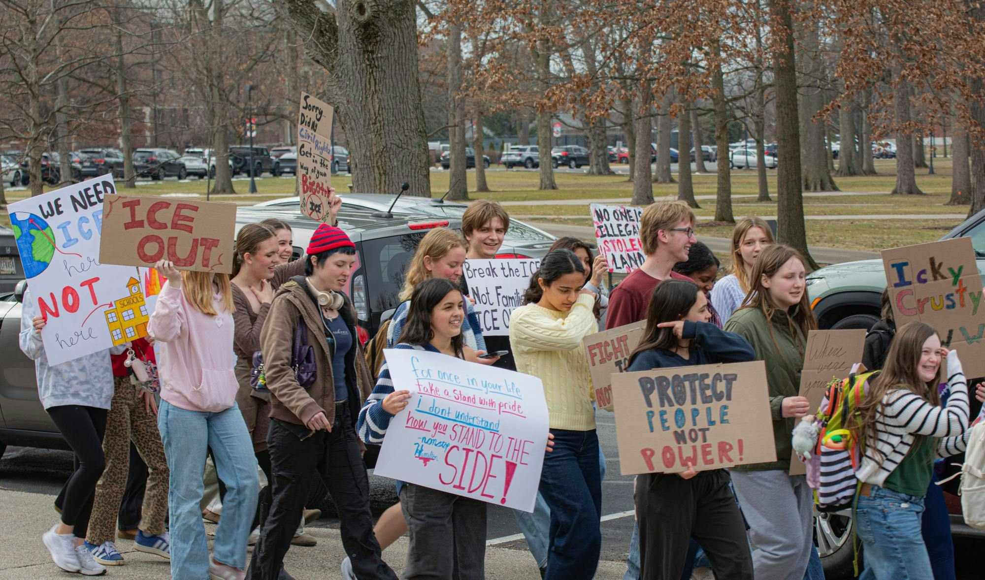 Passing in front of the Burkhardt building, Muncie Burris students chant together in protest of ICE. Feb. 17 Ball State University. Aiden Murray, NLI.