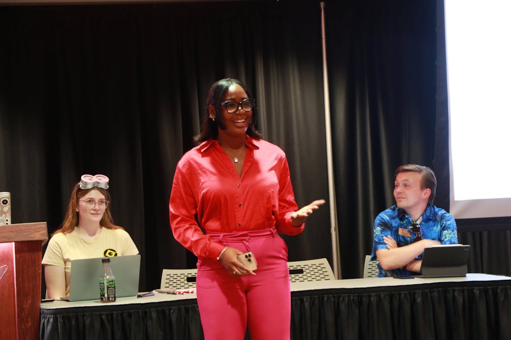 Senate applicant Aasha Watkins gives a presentation at the L.A. Pittenger Student Center during the Student Government Association (SGA) senate meeting on Oct. 30. Watkins spoke about why she would be ideal for the collegiate College of Communication, Information, and Media (CCIM) senate seat. Shelby Anderson, DN 