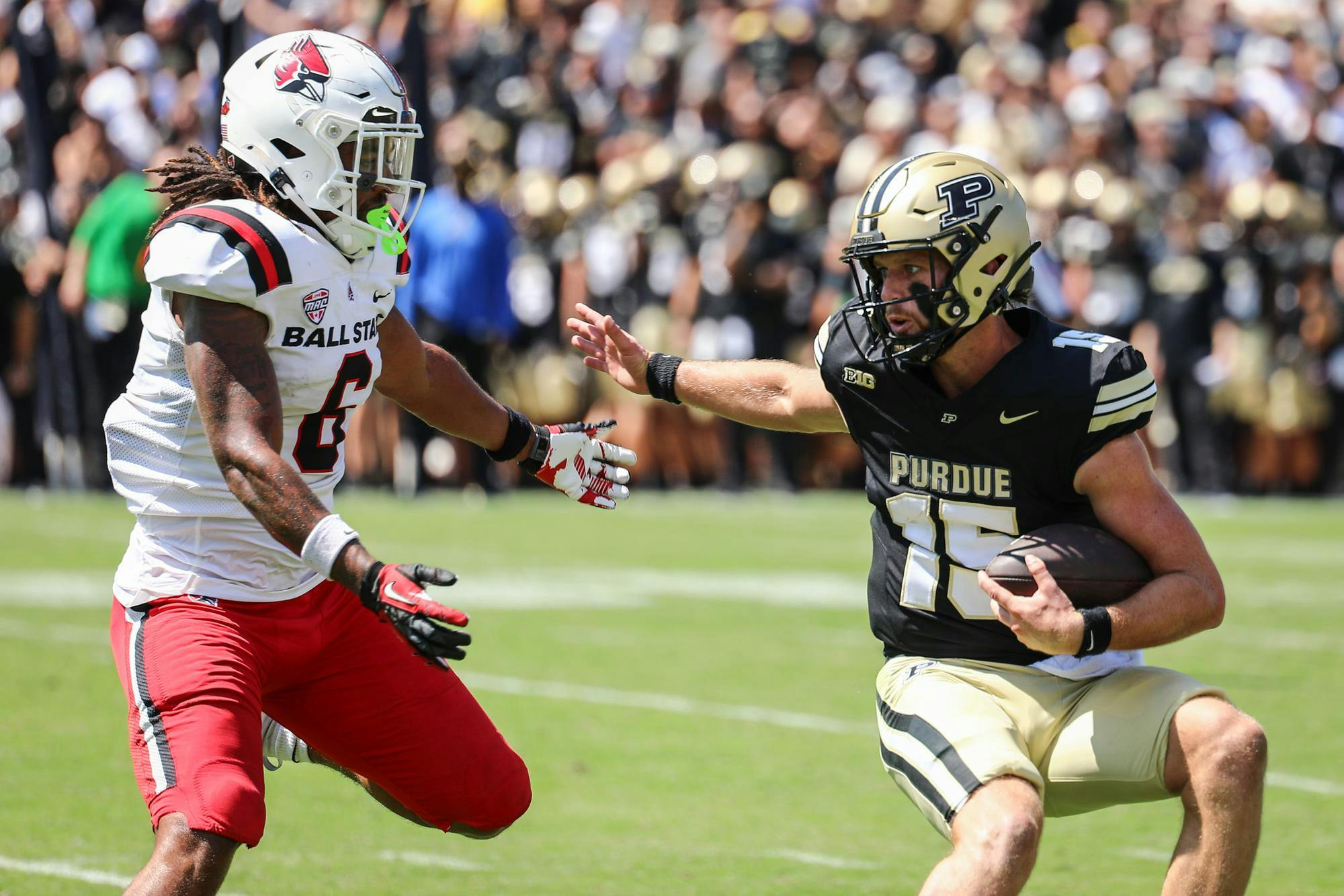 Purdue sophomore quarterback Ryan Browne runs the ball against Ball State Aug. 30 at Ross-Ade Stadium. Ball State lost to Purdue 31-0. Andrew Berger, DN 