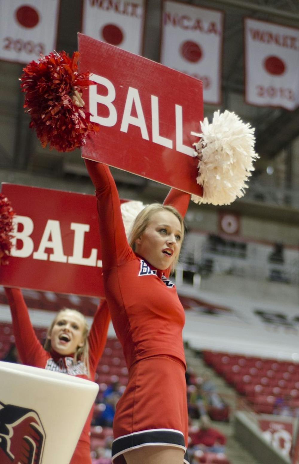 Ball State cheerleaders try to rally the crowd during the men's basketball game against Western Michigan on Feb. 26 at Worthen Arena. DN PHOTO AUDREY ADDINGTON 