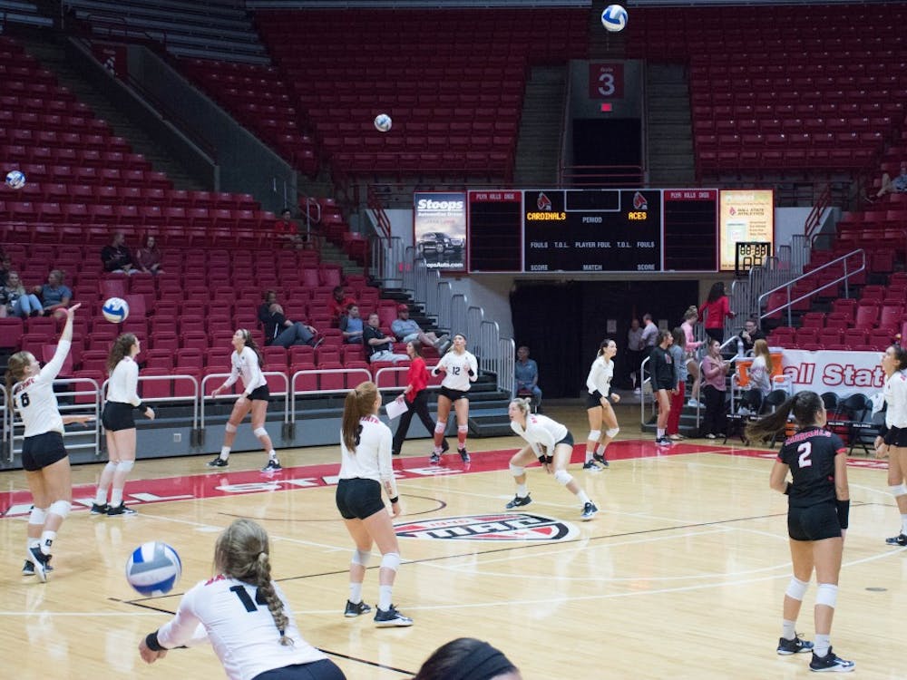 Ball State's womens volleyball team warms up after half time at the game against Evansville on Sept. 14 in John E. Worthen Arena. The Cardinals were 2-0 after halftime. Jada Coleman, DN