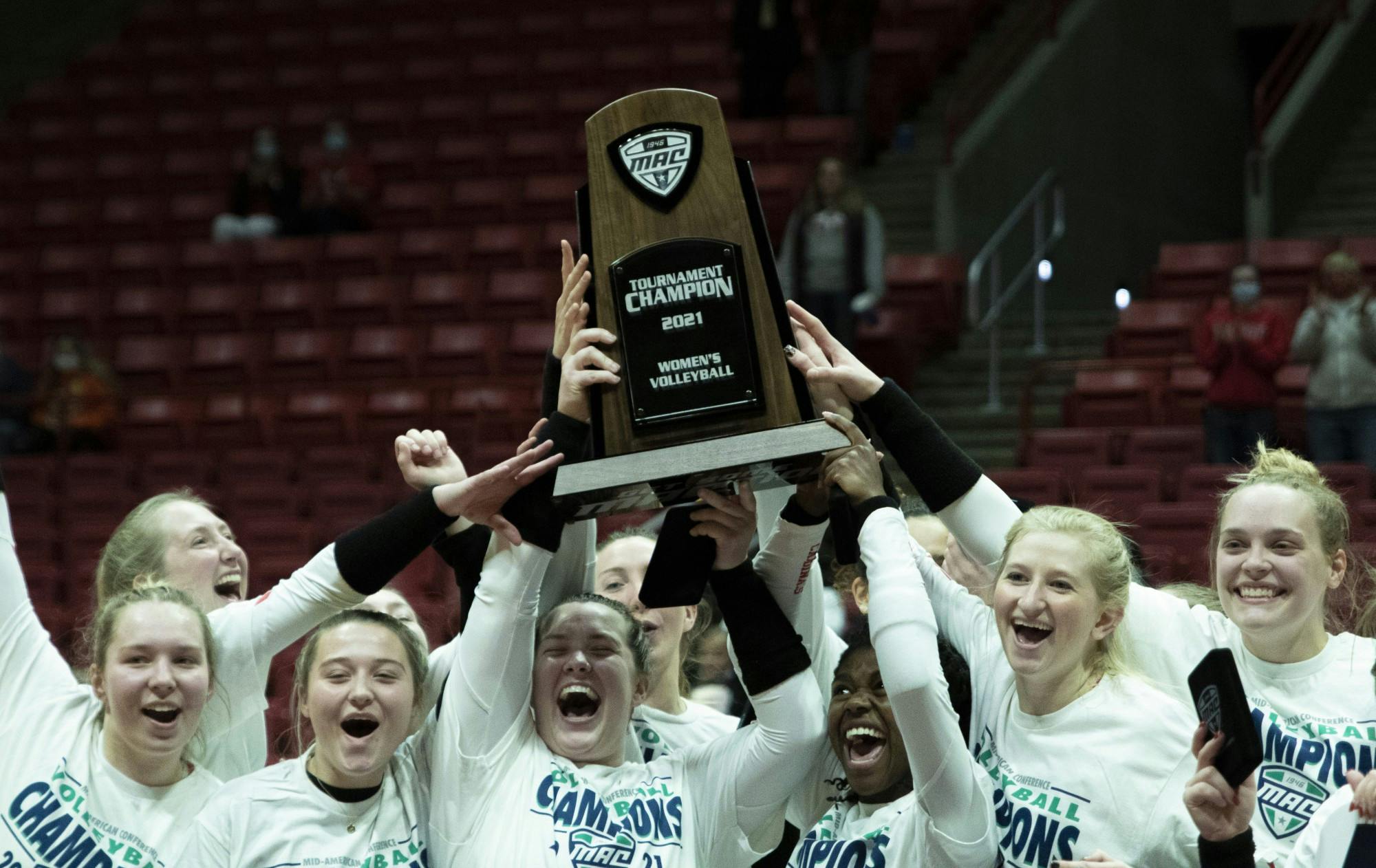 Members of the volleyball team celebrate after winning the Mid American Conference Championship game against the Bowling Green Falcons Nov. 24, 2021, at John E. Worthen Arena. The Cardinals beat the Falcons in five sets. Jacob Musselman, DN
