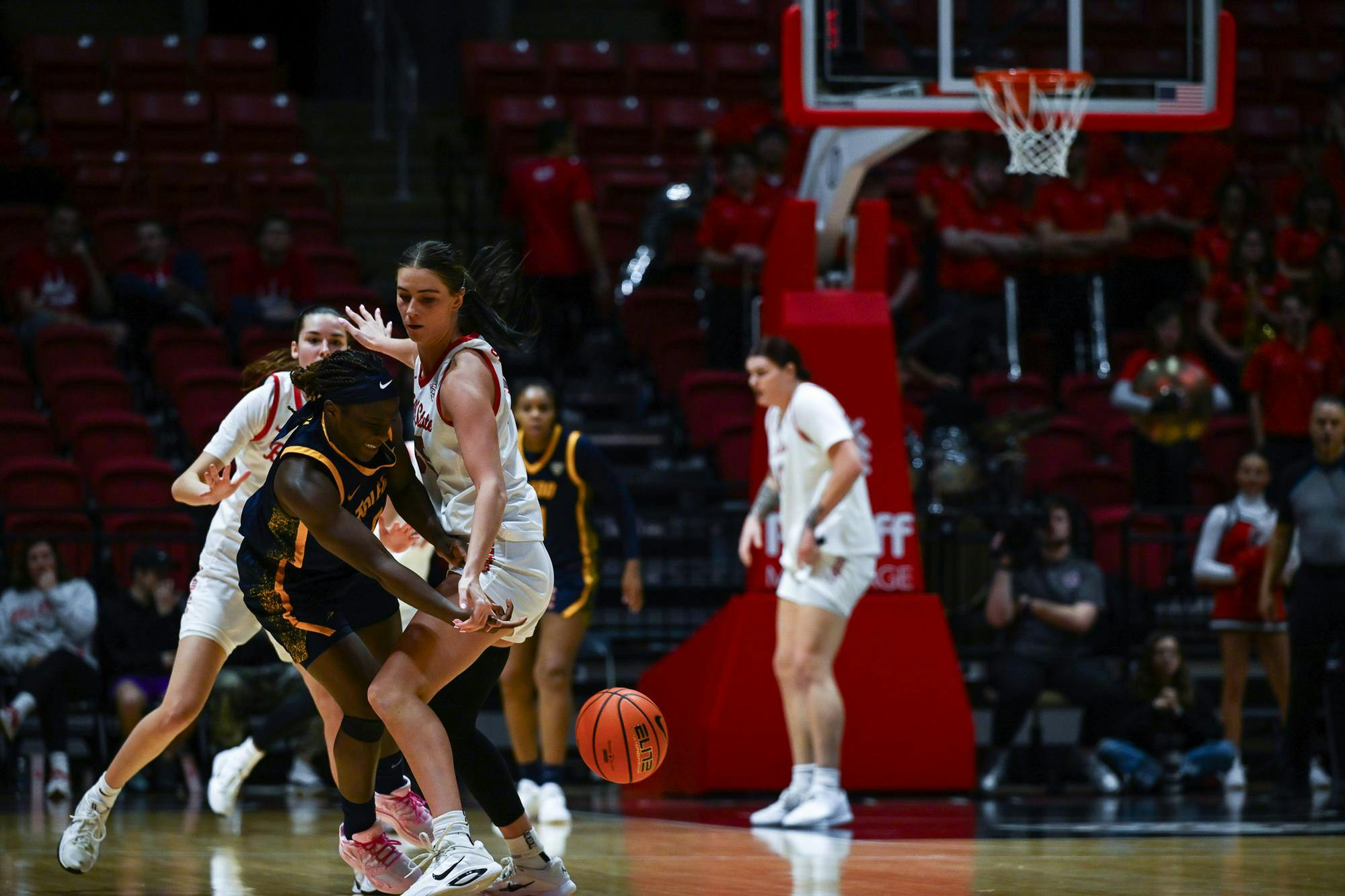 Toledo Rockets graduate student guard Patricia Anumgba releases the ball under pressure from senior forward Bree Selenbien Jan. 7 at Worthen Arena. Ryan Fleek, DN