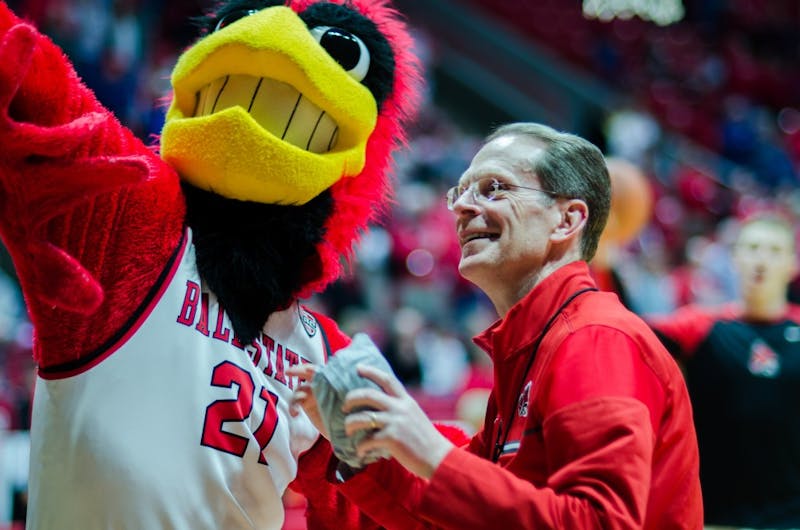 President Geoffrey Mearns and Charlie Cardinal throw a t-shirt to the fan section Feb. 9 in the John E. Worthen Arena. Ball State's men's basketball team defeated Kent State 87 to 68 for the first time since 2005. &nbsp;Stephanie Amador, DN