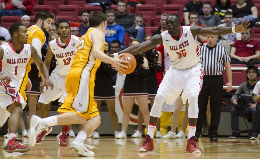 Senior center Majok Majok plays defense in the game against Valparaiso on Dec. 4 at Worthen Arena. DN PHOTO BREANNA DAUGHERTY