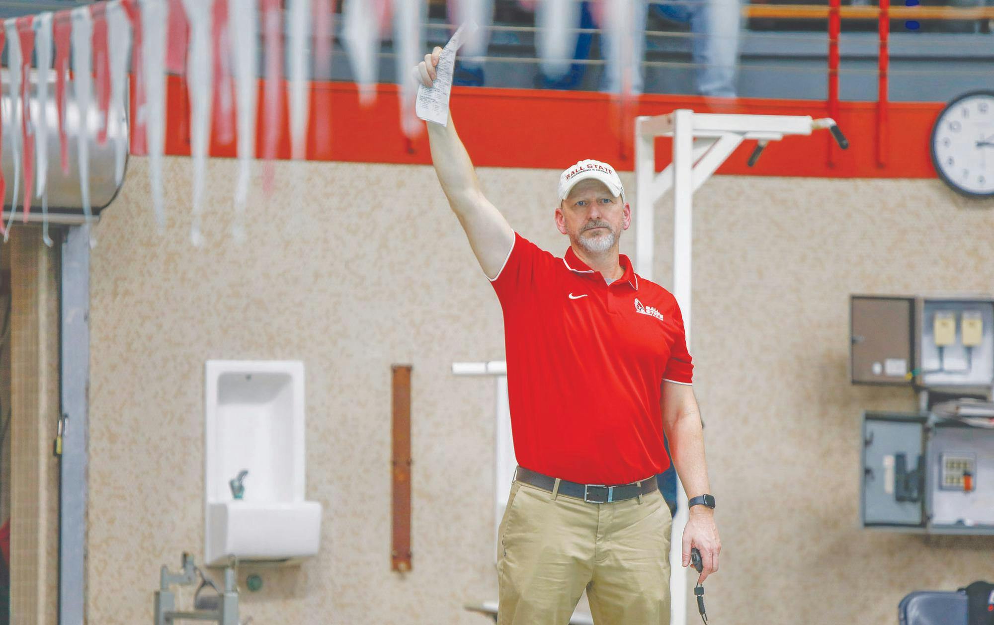 Ball State womens swim and dive head coach J. Agnew watches times come in Jan. 20 against Toledo at Lewellen Aquatic Center. Ball State won 182-117 over Toledo. Andrew Berger, DN