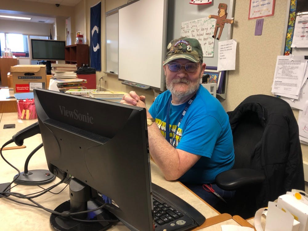 <p>Northview Elementary librarian Mike Lewis waits for his next class to come to the library. Lewis has been helping Muncie Community Schools since 2007. <strong>Demi Lawrence, DN</strong></p>