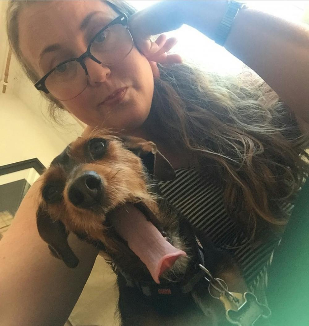 <p>Journalism professor Colleen Steffen and her dog, Smokey.&nbsp;Steffen and her family rescued Smokey from the Animal Rescue Fund about two years ago.&nbsp;<i style="background-color: initial;">Photo Provided // Colleen Steffen&nbsp;</i></p>