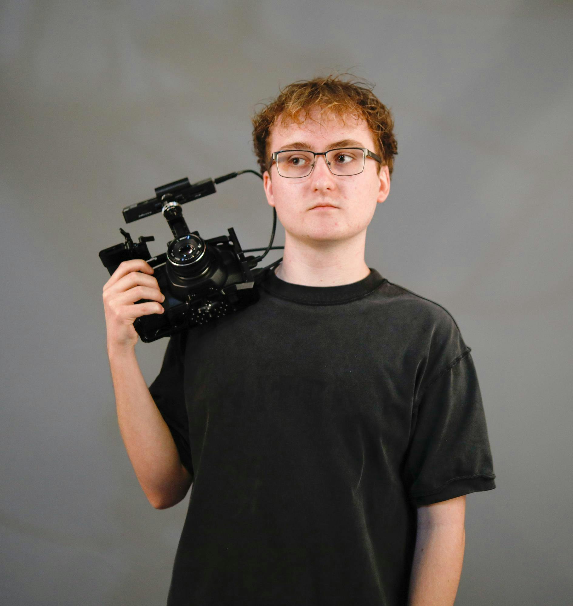  Senior Jacob Boissy poses for a photo April 16 at the Art and Journalism Building. Boissy said that the one advice he’d give his freshman self is to stop worrying. Andrew Berger, DN 
