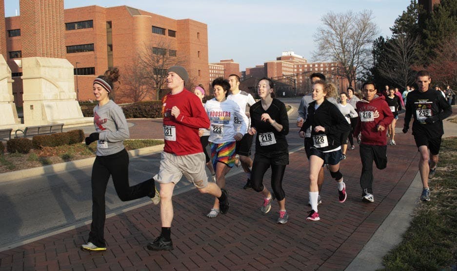 Runners take off at the Baby Steps 5K on campus Saturday morning. The 5K was put on by seniors Alaina Hartman and Audrey Van Acker to raise awareness for the Delaware County Head Start program. DN PHOTO LOGAN WINSLOW