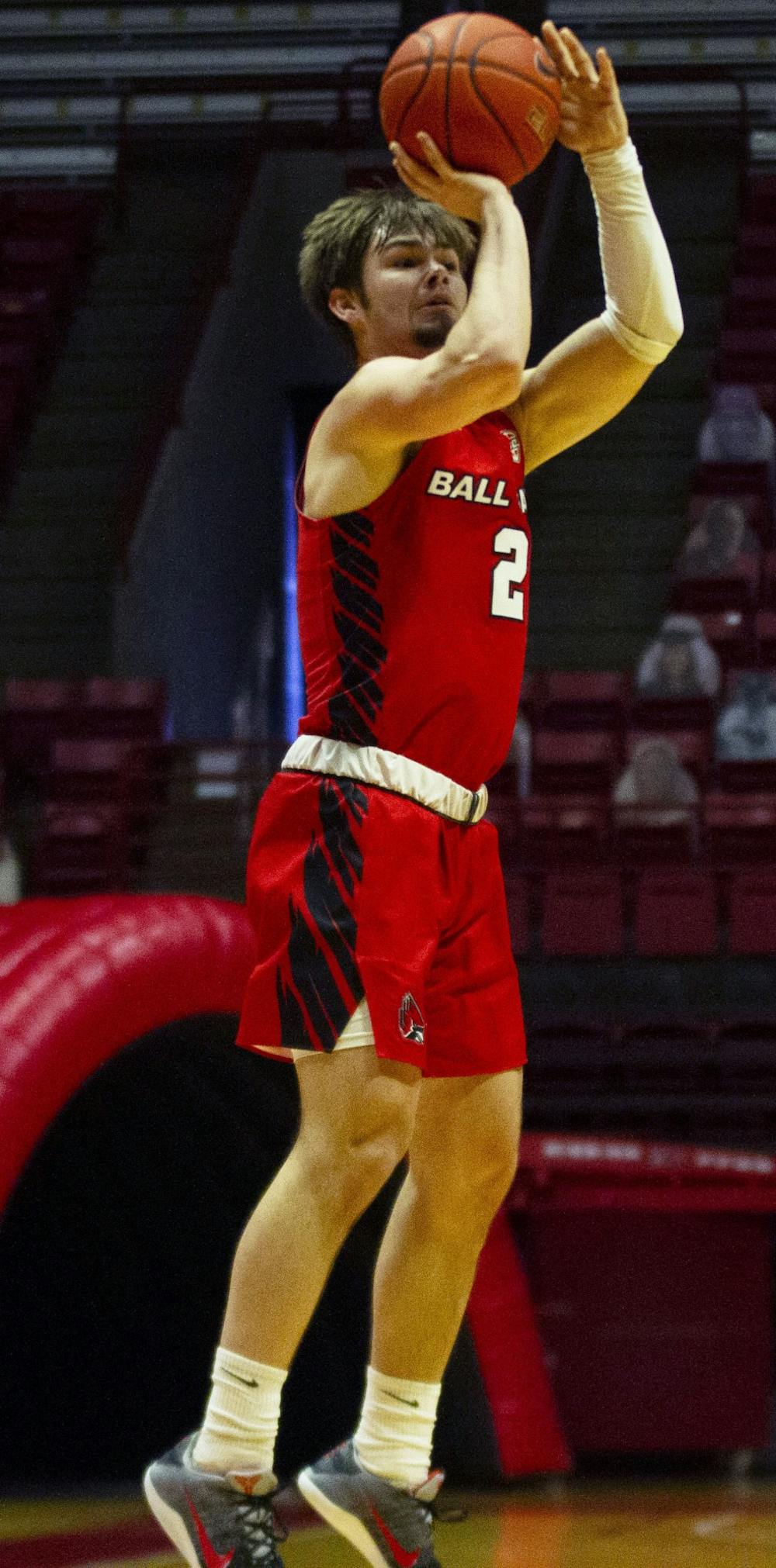 <p>Sophomore guard Luke Bumbalough shoots a three point shot Feb. 27, 2021, in John E. Worthen Arena. The Cardinals won 97-91 against the Chippewas.<strong> Grace Walton, DN</strong></p>