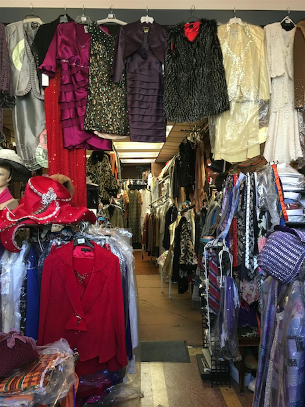 <p>Mattie Coleman, known as Muncie's "hat lady," owns the Towne Boutique on Walnut Street. The shop, which as been around for 45 years, sells hats, scarves and clothes. <em>Michelle Kaufman // DN</em></p>