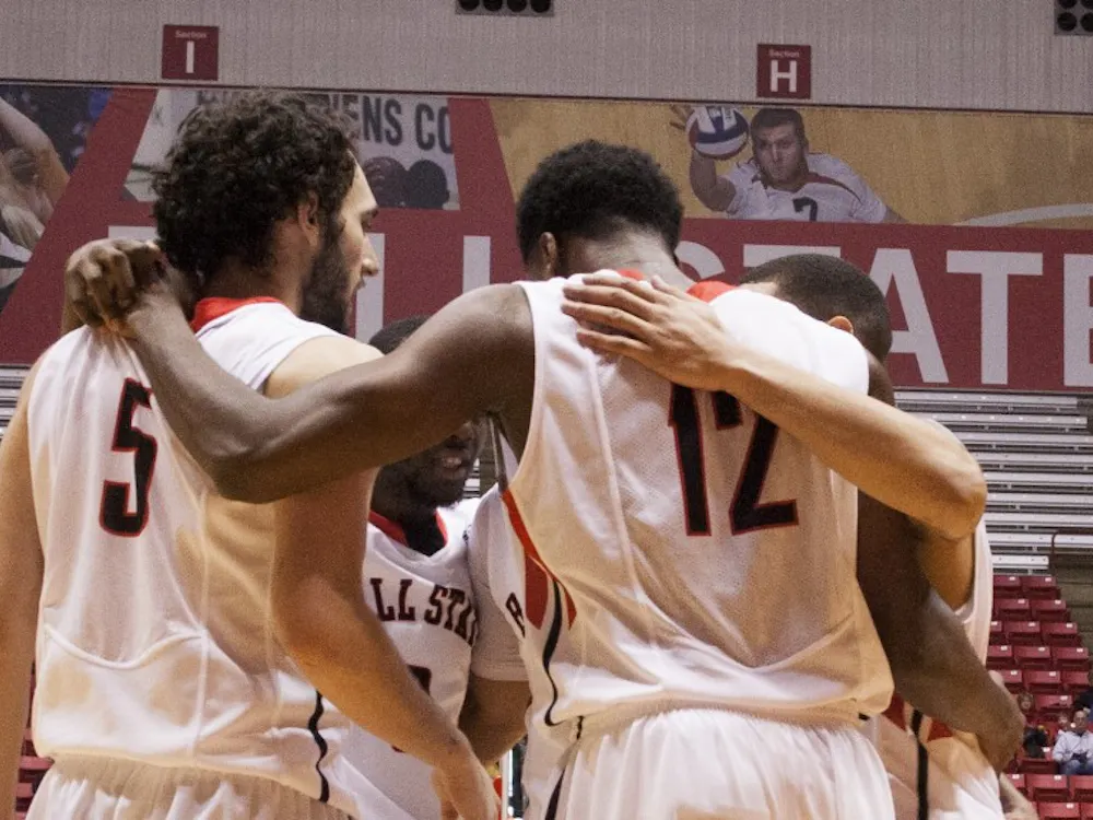 The mens' basketball team huddles during the game against Bowling Green on Feb. 14 at Worthen Arena. DN PHOTO EMILY CUNNINGHAM