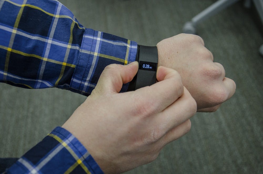 <p>The Ball State Clinical Exercise Physiology Program found activity trackers, like a&nbsp;Fitbit shown above,&nbsp;are not as accurate as we think, according to a newly released study. The study began in the&nbsp;Fall 2014 semester; at the time there were 3.5 million trackers sold every year&nbsp;in the United States. The Fitbit company has been facing a lawsuit since earlier this year due to the inaccuracies.&nbsp;&nbsp;<em>DN FILE PHOTO BREANNA DAUGHERTY&nbsp;</em></p>