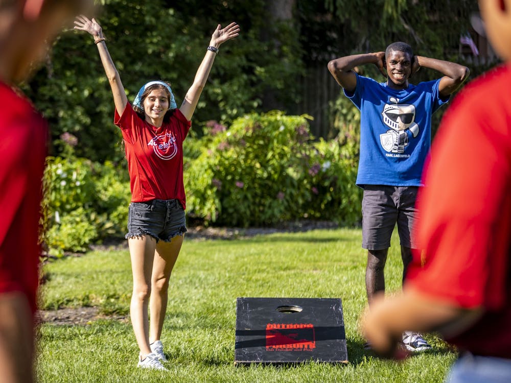 A Ball State student plays cornhole at the Summer Bridge Accelerate dinner Aug. 16 at Bracken House with President Mearns. Samantha Blankenship, Ball State University, Photo Provided