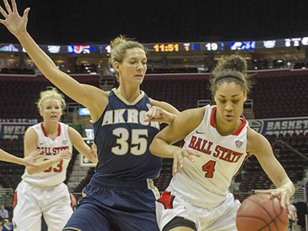 Nathalie Fontaine drives towards the paint in order to score for Ball State. DN PHOTO COREY OHLENKAMP