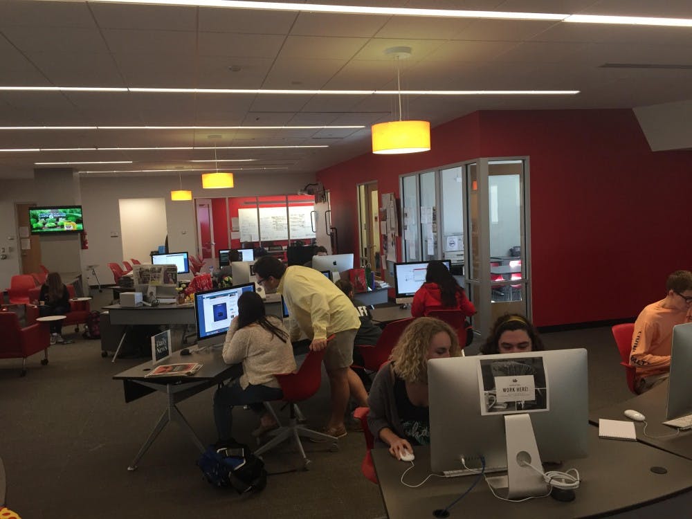 Daily News editors and reporters working in the Unified Media Lab April 25. Casey Smith, DN
