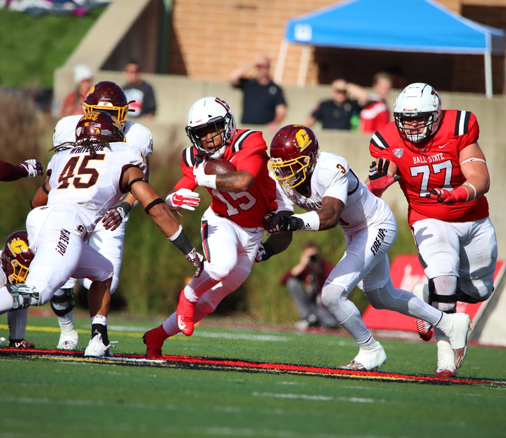 Redshirt junior running back Marquez Cooper runs the ball against Central Michigan Oct. 21 at Scheumann Stadium. Cooper had 39 long rushing yards in the game. Mya Cataline, DN