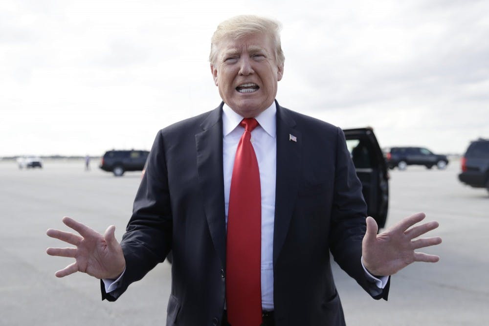 <p>President Donald Trump boards Air Force One, Sunday, March 24, 2019, at Palm Beach International Airport, in West Palm Beach, Fla., en route to Washington. <strong>(AP Photo/Carolyn Kaster)</strong></p>