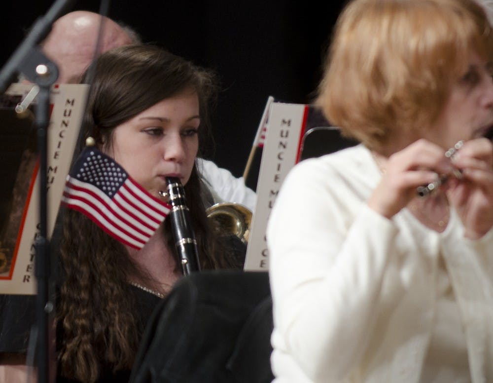 A member of the Muncie Central High School band performs at the 