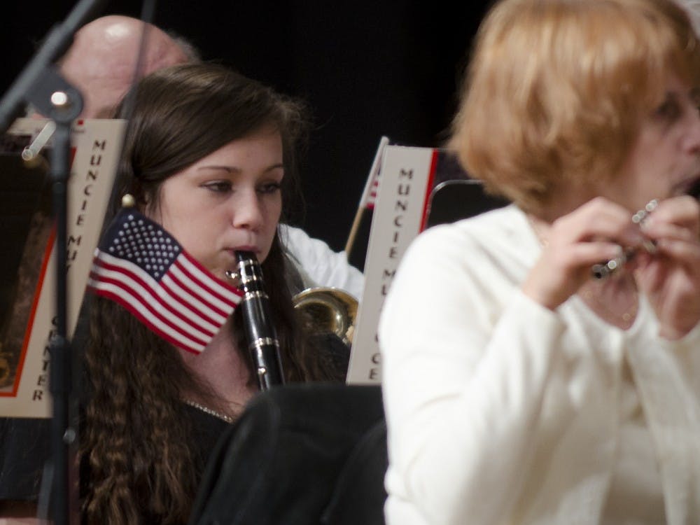 A member of the Muncie Central High School band performs at the 