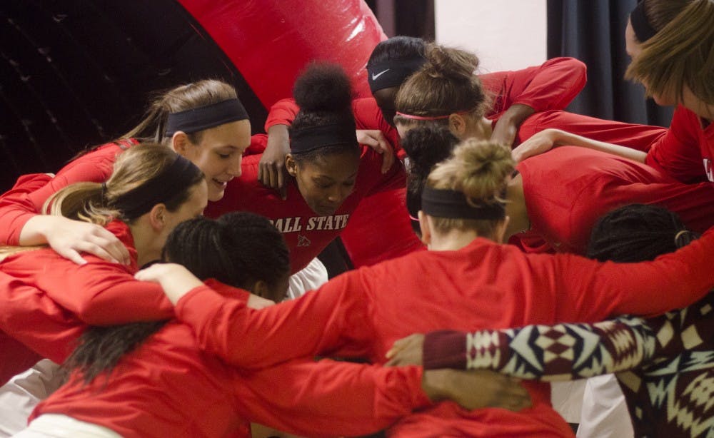 Members of the women's basketball team prepare to run out on the court before the game against Evansville on Nov. 19 at Worthen Arena. DN PHOTO BREANNA DAUGHERTY