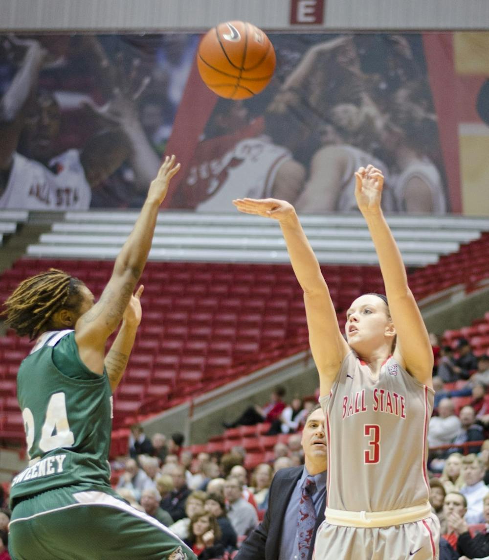 Junior guard Shelbie Justice shoots a three-point shot against Eastern Michigan on Feb. 23 at Worthen Arena. DN PHOTO BREANNA DAUGHERTY