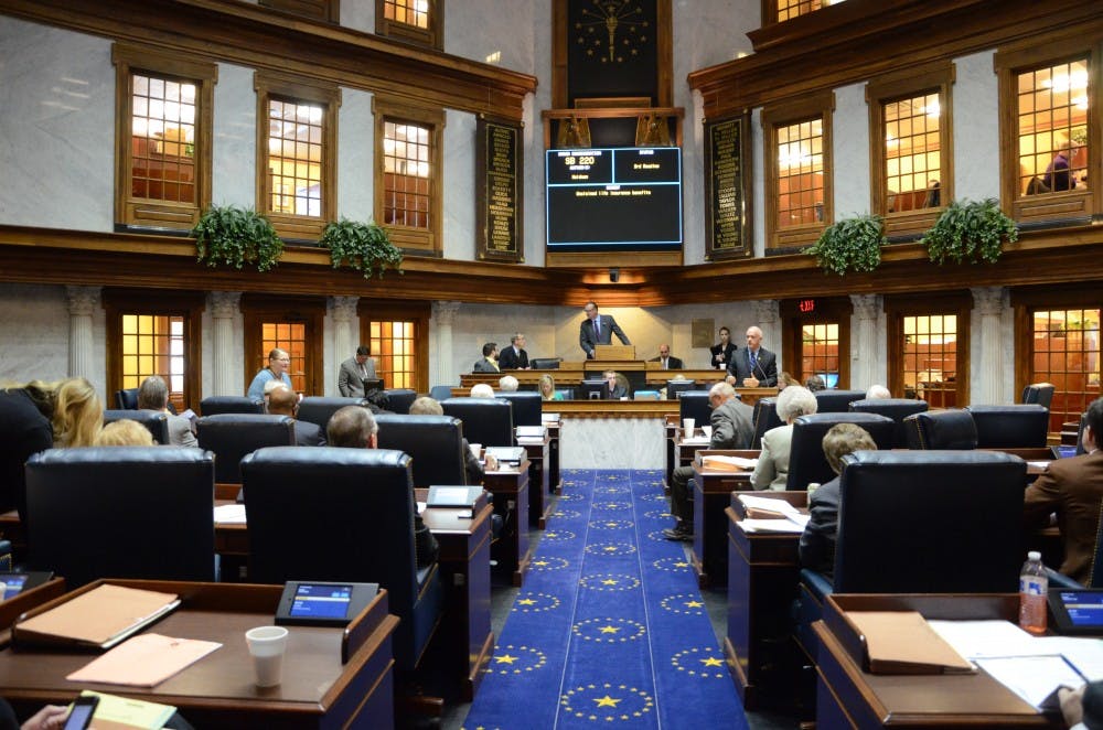 The Indiana State Senate votes on the day's legislation during the 2014 session. Senators and representatives returned to the Statehouse Monday to begin the 2015 legislative session. DN PHOTO ARIC CHOKEY