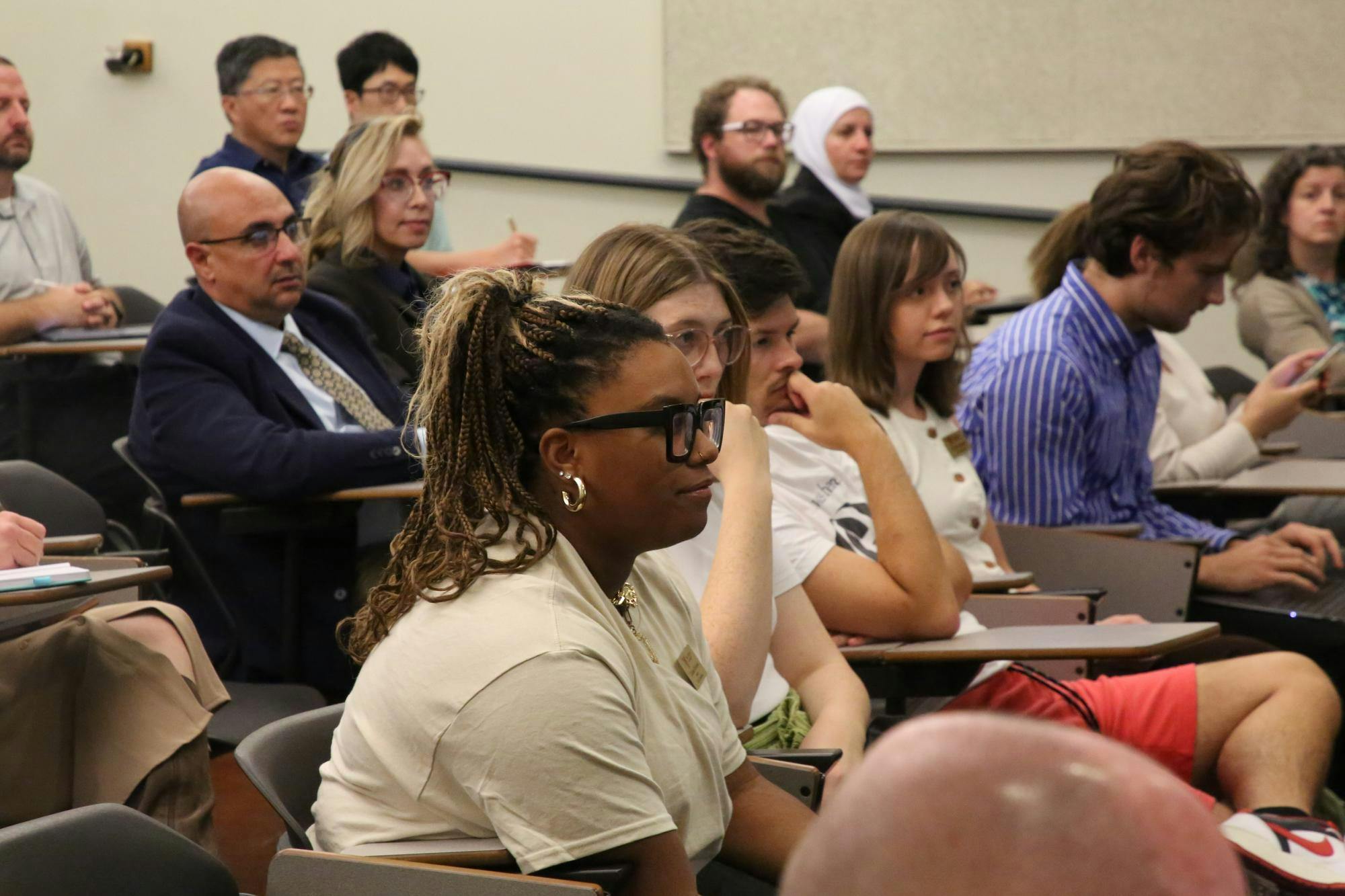 SGA President Chelsea Murdock asks President Geoffrey Mearns a question about how to get student faith and trust back during the Oct. 2 University Senate meeting in Ball Communications Building. Landon Jones, DN