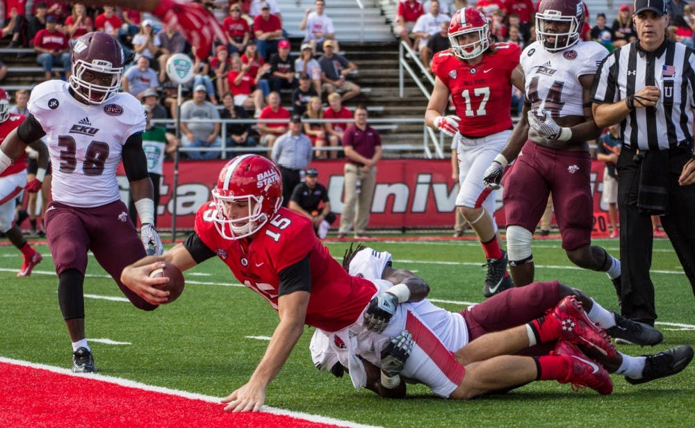 Ball State’s quarterback Riley Neal makes a touchdown during the home opener game against Eastern Kentucky on Sept. 17 in Scheumann Stadium for Family Weekend. Ball State won 41-14. Grace Ramey // DN