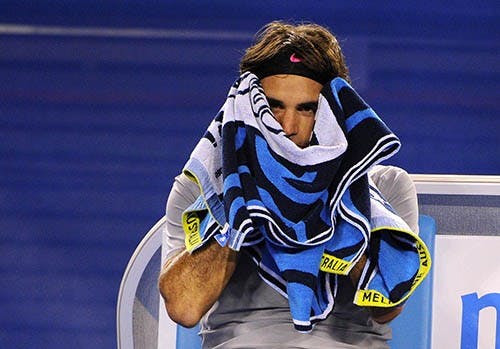 Roger Federer takes a break during the Australian Open in Melbourne, Australia, on Saturday, January 19, 2013. Federer captured his 900th career win at the French Open last week. MCT PHOTO
