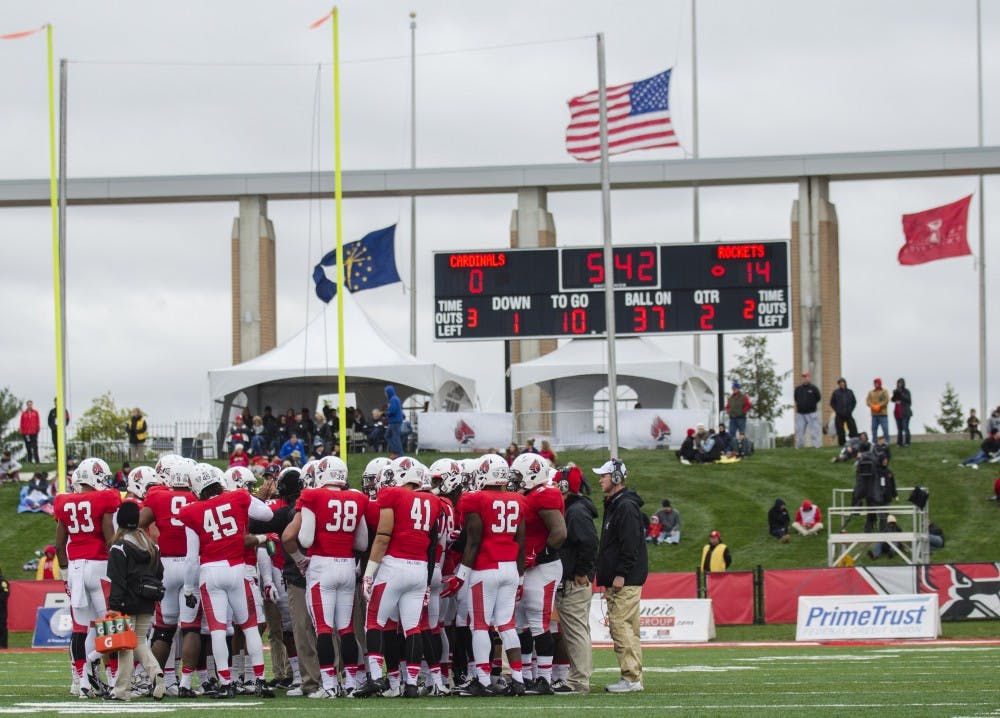 The Ball State football team huddles up during the second quarter in the game against Toledo on Oct. 2 at Scheumann Stadium. Ball State lost 24-10. DN PHOTO BREANNA DAUGHERTY